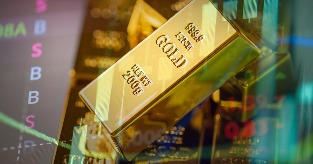 Gold bars displayed prominently in front of a stock market backdrop, symbolizing wealth and investment opportunities.
